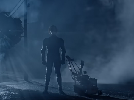 Jobe and a lawnmower backlit, aura farming, and surrounded by ominous fog